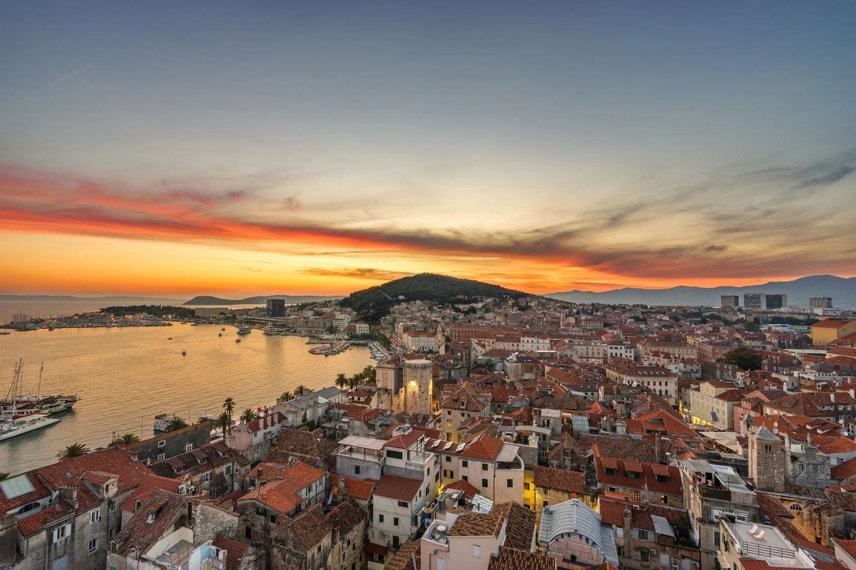 Split old town rooftops and harbour at sunset